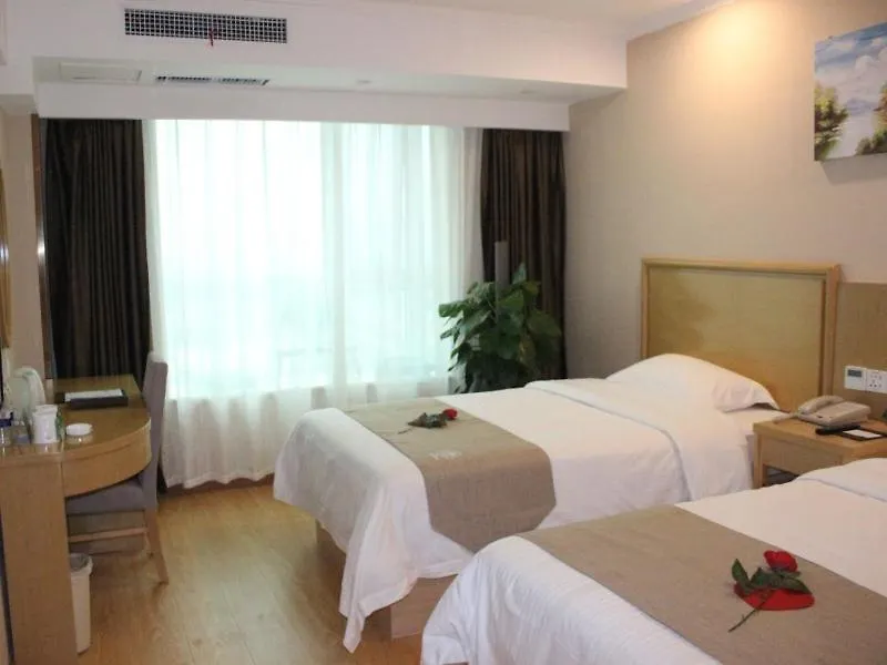 *** Szálloda Greentree Inn Henan Zhumadian Xincai Yueliang Bay Business Hotel. Kína